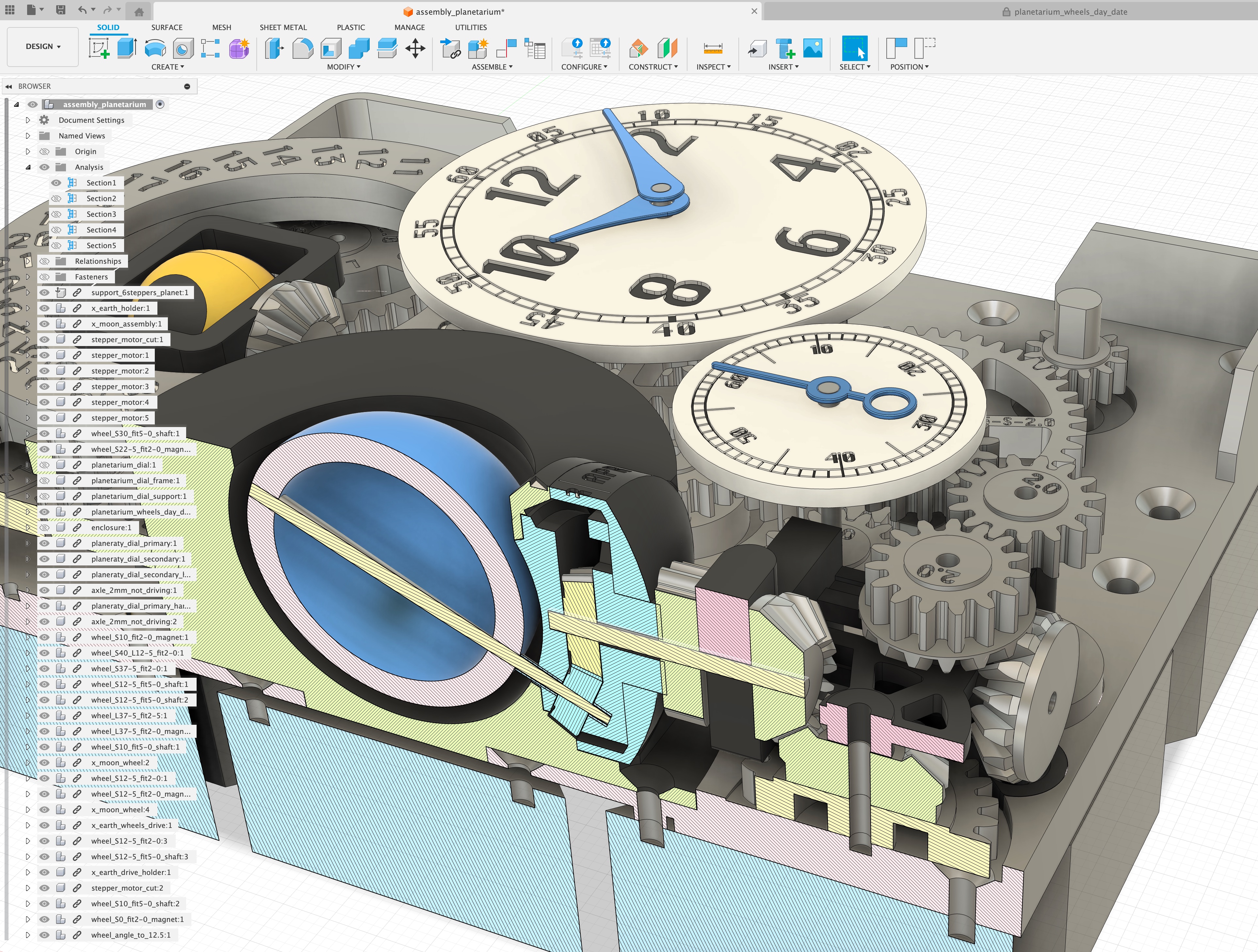 Detailed CAD assembly view with suspended Earth model and gear systems